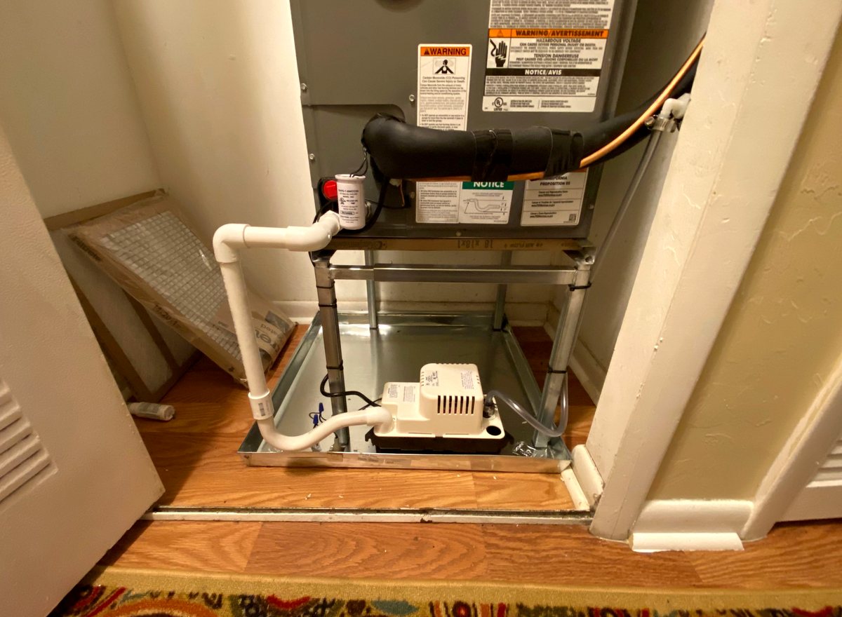 Float safety switch mounted on the condensate line at the air handler.